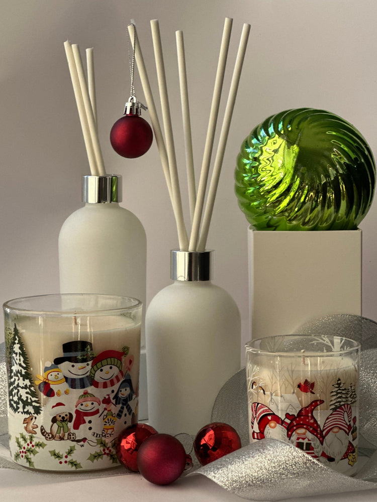 Ho Ho Glow Candle Collection